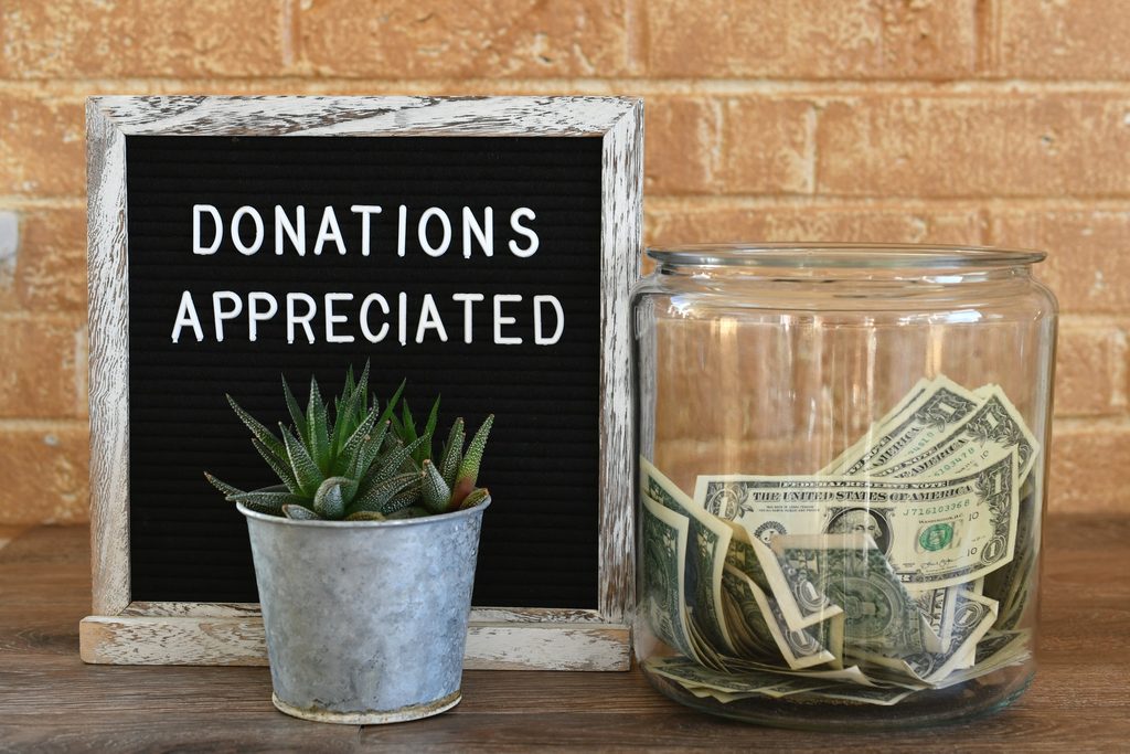 jar-of-money-cash-donations-appreciated-sign-message-board-contributions-tips-collection
